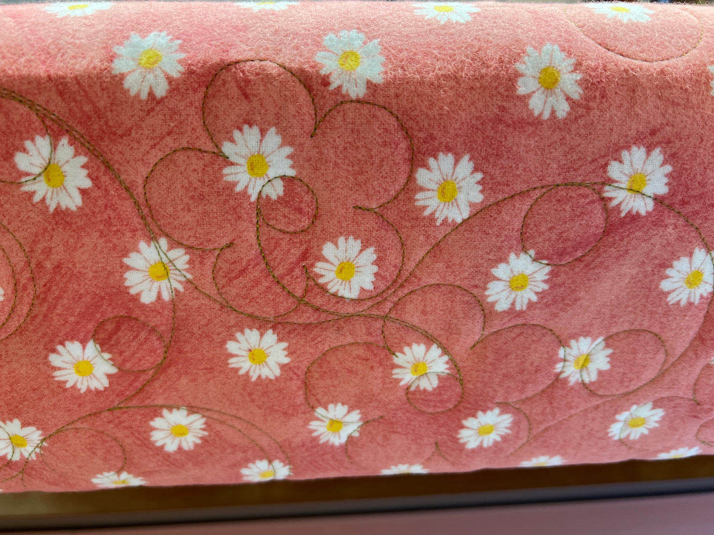 Long arm Quilting for Brenda Hays - Batik quilt with orange border, quilted with daisies and glide, prickly pear thread